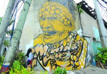 This Binukot mural – painted by local artists Archie Oclos and Dennis Bato – is an artwork of Rosita Caballero. She was the last known kept maidens of Panay Bukidnon. She died last July 2017 at the age of 73. Binukot is a tradition where a much selected women are kept hidden and are not allowed to be seen by any man until a certain age. IAN PAUL CORDERO/PN