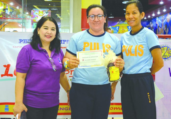 Jemin Guillermo Philippine Information Agency VI Officer in Charge Jemin Guillermo (left)