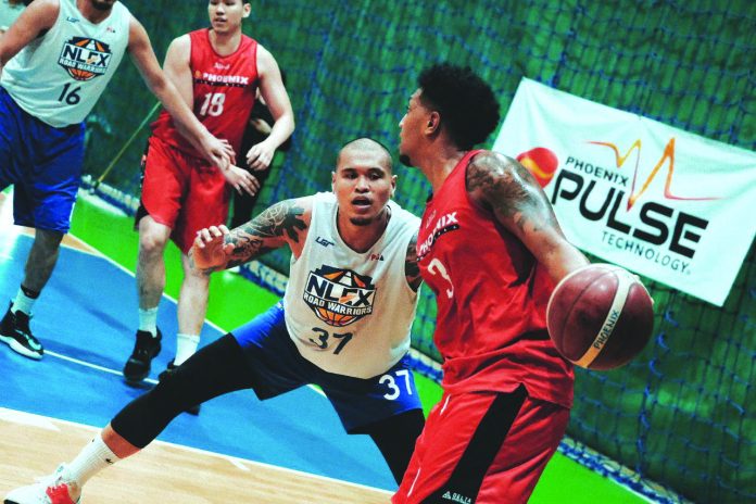 NLEX’s Joseph Ronald Quiñahan (No.37) leads the Road Warriors in their 104-97 victory against tournament host Phoenix Pulse Fuel Masters on Feb. 21. ABS-CBN SPORTS NLEX’s Joseph Ronald Quiñahan (No.37) leads the Road Warriors in their 104-97 victory against tournament host Phoenix Pulse Fuel Masters on Feb. 21. ABS-CBN SPORTS