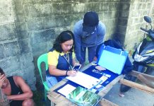 Minor falls in buy-bust Antidrug officers inspect items seized from a 17-year-old minor. He was nabbed in an entrapment operation in Barangay 2 on Feb. 15. POLICE STATION 2/BCPO