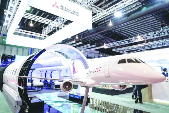 Mitsubishi Aircraft Spacejet A static model of a Mitsubishi Aircraft Spacejet sits on display at the Singapore Airshow on Tuesday, Feb. 11, 2020, in Singapore. AP
