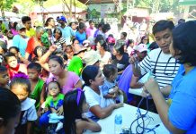 Mothers, children and senior citizens avail free dental, medical and other services provided by the government during the Serbisyo Caravan in Barangay Montilla, Moises Padilla, Negros Occidental on Feb. 18. The delivery assistance was in line with the implementation of the Retooled Community Support Program