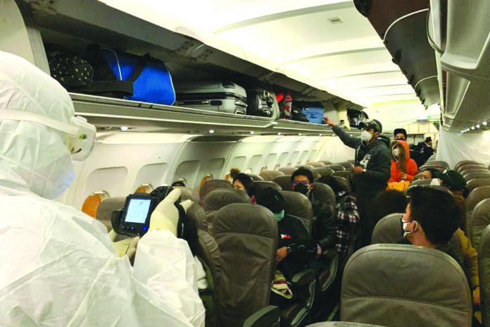coronavirus The chartered Royal Air flight carrying the 30 repatriates and the 10-member government repatriation team landed around 7 a.m. on Sunday at the Haribon hangar of the Philippine Air Force in Clark, Pampanga province, north of Manila. DEPARTMENT OF FOREIGN AFFAIRS