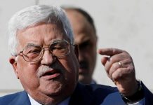 Palestinian President Mahmoud Abbas gestures as he speaks during a ceremony marking the 15th anniversary of the death of his predecessor Yasser Arafat, in Ramallah in the Israeli-occupied West Bank on Nov. 11, 2019. REUTERS/MOHAMAD TOROKMAN