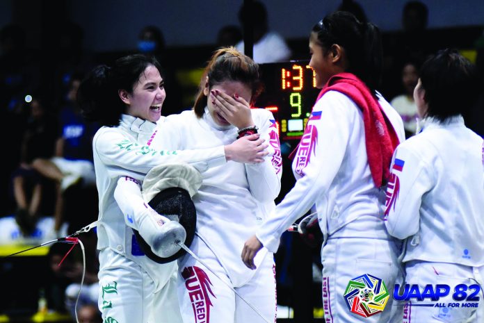 Players of the University of the East Lady Warriors epee team are in tears after clinching the women’s overall championship. UAAP