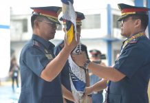 ‘A BIG CHALLENGE’ Solve slay cases, new ICPO director told CHANGE OF COMMAND. Police Colonel Eric Dampal (left) formally takes over as director of the Iloilo City Police Office during a change of command presided by Police Brigadier General Rene Pamuspusan (right), Western Visayas police director, on Feb. 20, 2020. Looking on (partly hidden) is Dampal’s predecessor, Police Colonel Martin Defensor, now the chief of the Directorial Staff, Police Regional Office 6. IAN PAUL CORDERO/PN
