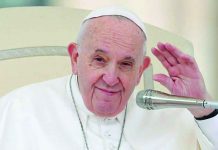 Pope to Catholics: For Lent, give up trolling Pope Francis waves during the weekly general audience at Vatican, Feb. 26, 2020. REUTERS