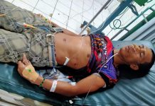Shooting lands man in hospital Reynante Langote receives medical treatment at a hospital after he was shot in Barangay Granada, Bacolod City on Feb. 1. POLICE STATION 5/BCPO