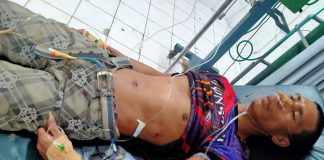 Reynante Langote receives medical treatment at a hospital after he was shot in Barangay Granada, Bacolod City on Feb. 1. POLICE STATION 5/BCPO