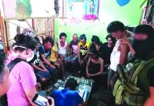 16 persons fall in buy-bust Antidrug officers inspect items seized from 16 drug suspects in Barangay 6, San Carlos City, Negros Occidental on Feb. 25. PDEA REGION VI