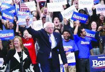 US solon Sanders wins New Hampshire primary Democratic presidential candidate Sen. Bernie Sanders, I-Vt., with his wife Jane O'Meara Sanders, arrives to speak to supporters at a primary night election rally in Manchester, N.H., Tuesday, Feb. 11, 2020. AP
