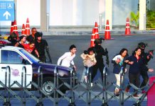 Thai soldier kills 26 in shooting rampage Thai security forces evacuate people who were stranded inside the Terminal 21 shopping mall following a gun battle, to try to stop a soldier on a rampage after a mass shooting, Nakhon Ratchasima, Thailand Feb. 9, 2020. REUTERS