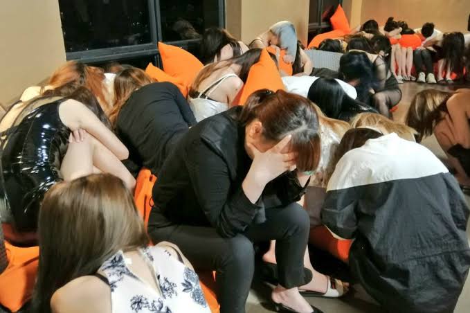 nation Anti-wiretap Authorities rescue women from a prostitution den in Makati on October last year. With most of the sex trafficking activities happening online, an official of the Department of Justice said lawmakers should consider relaxing provisions of the Anti-Wiretapping Law. ABS-CBN NEWS