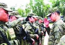 Major General Eric Vinoya (right), commander of the Philippine Army’s 3rd Infantry Division, rallies the troops of the 12th Infantry Battalion (12IB) during the start of their organizational training on Feb. 3. The 12IB will be converted to a maneuver battalion, which will provide Panay Island with more foot soldiers to fight insurgency. 3ID PUBLIC AFFAIRS OFFICE