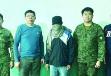 High-ranking NPA rebel surrenders Authorities facilitate the surrender of New People's Army (NPA) member “Cardo” (3rd from left) at Camp Monteclaro, Barangay Igtuba, Miag-ao, Iloilo on Feb. 22. The surrenderee was under the NPA's Southern Front, Komiteng Rehiyon-Panay, which operates in Tubungan, Iloilo. CONTRIBUTED PHOTO