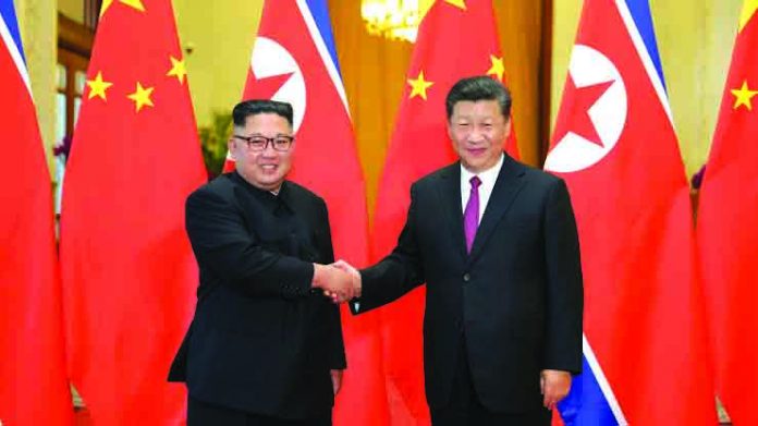 Kim Jong Un, Xi Jinping North Korean leader Kim Jong Un visits President Xi Jinping in Beijing, China. BUSINESS INSIDER PHOTO