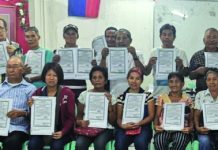 102 NegOcc ARBs receive redocumented land titles Some of the 19 agrarian reform beneficiaries receive certificate of land ownership awards to around 55 hectares of redocumented land in Barangay Felisa, Bacolod City on March 5. DAR NEGROS OCCIDENTAL I-NORTH