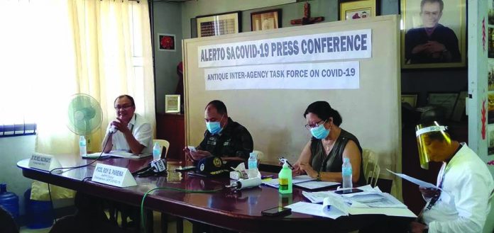 Antique Provincial Health Officer Dr. Ric Noel Naciongayo (left) explains the status of the coronavirus disease 2019 in the province. He also commended the untiring efforts of the frontliners in the fight to surppress the spread of the virus. PIA