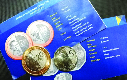 Bangko Sentral ng Pilipinas Iloilo Branch displays the new P20 and enhanced version of the P5 New Generation Currency coins. PNA