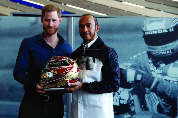 Britain's Prince Harry and Formula One World Champion Lewis Hamilton Britain's Prince Harry and Formula One World Champion Lewis Hamilton pose with one of Hamilton's helmet as they visit the Silverstone Experience at Silverstone circuit, in Towcester, Britain on March 6. REUTERS/PETER NICHOLLS/POOL