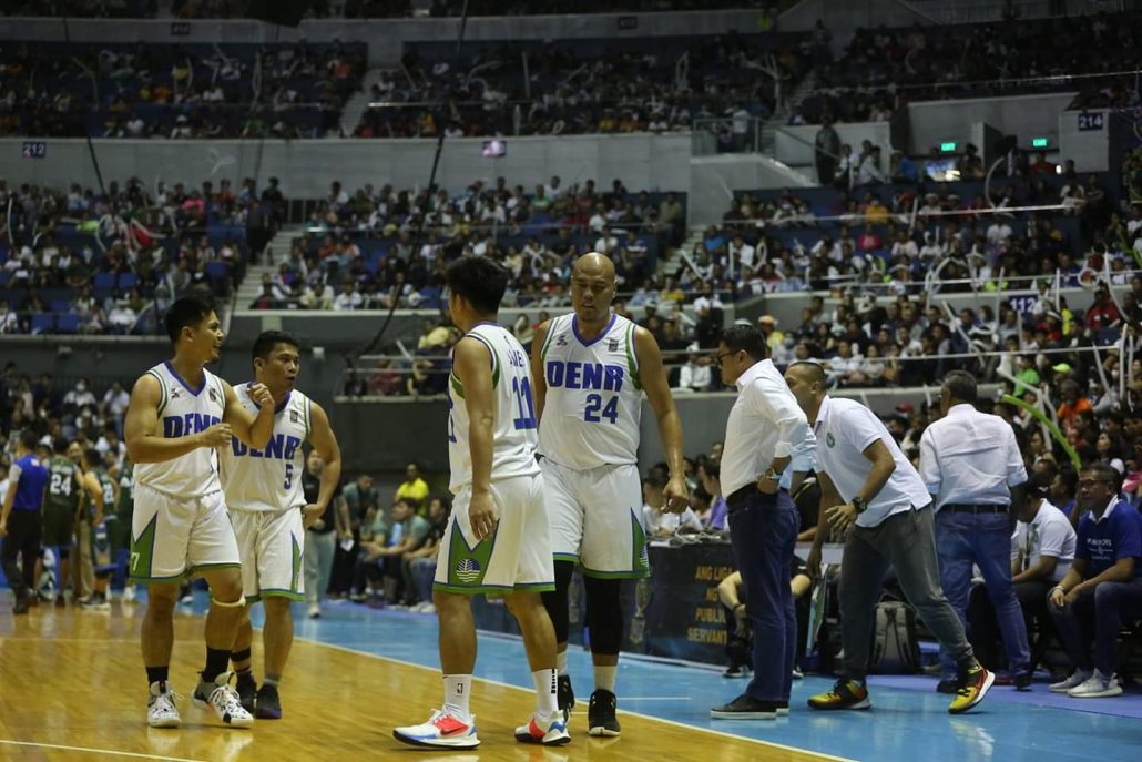 DENR Warriors players (from left) Paul Parreño, Jay-r Atablanco, Jr., Ryan Abanes, and Ed Rivera during one of the timeouts of Game 2 championship game