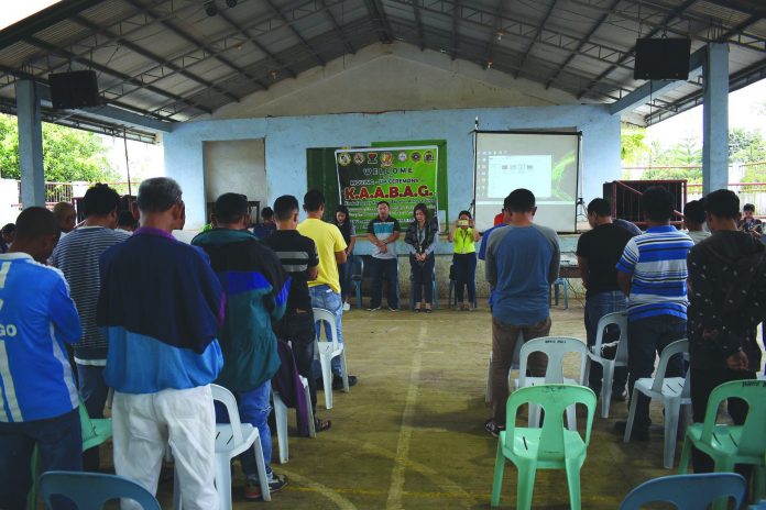 Drug surrenders from Barangay Codcod and Barangay Quezon, San Carlos City, Negros Occidental attend the graduation of the Kinabuhi Angay Ampingan Bag-Uhon Alang sa Ginoo (KAABAG) in Barangay Codcod on Feb. 28. KAABAG is a 90-day Community-Based Drug Rehabilitation Program hosted by the local government of the city. SAN CARLOS CITY, NEGROS OCCIDENTAL-LGU