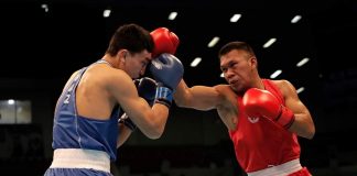 Filipino Eumir Marcial lands a punch on Abilkham Amankul of Kazakhstan. PHOTO COURTESY OF JORDAN OLYMPIC COMMITTEE