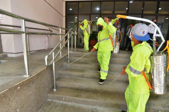 Iloilo City Hall Wearing protective suits, these Iloilo City government personnel disinfect city hall as part of precautionary measures against the novel coronavirus causing a pneumonia-like disease called COVID-19. Work at city hall was suspended yesterday afternoon, March 12, 2020, for the disinfection. IAN PAUL CORDERO/PN