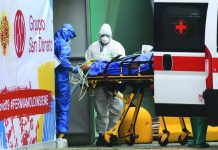 Battered Italy sees rays of hope in grim death data The number of new officially registered infections fell from 6,557 on Saturday to 4,789 on Monday. AFP