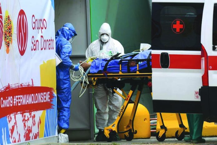 Italy Coronavirus The number of new officially registered infections fell from 6,557 on Saturday to 4,789 on Monday. AFP
