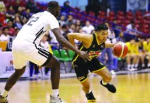 UST clobbers TIP in PBA D-League Negrense Mark Nonoy of Builders Warehouse UST Growling Tigers tries to get pass the defense of Papa Ndiaye of the Technological Institute of the Philippines Engineers. PBA