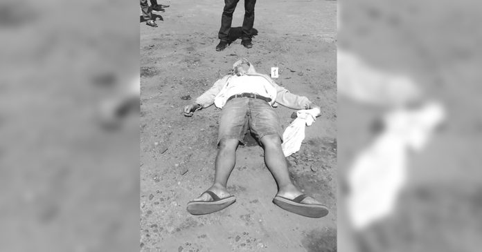 Nole Mercado Nole Mercado lies on the ground after he was shot to death by two unidentified motorcycle-riding gunmen in Barangay 2, San Carlos City, Negros Occidental on March 12. CYRUS GARDE/PN