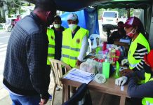 Personnel of the Roxas City Anti-Corona Task Force Border Patrol Team conduct a checkpoint to motorists and passengers in one of its borders on March 18. This is one of the city government’s efforts to curb the spread of the coronavirus disease 2019. ROXAS CITY COMMUNICATIONS GROUP