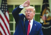 Trump ditches hopes of quick virus bounce-back for US