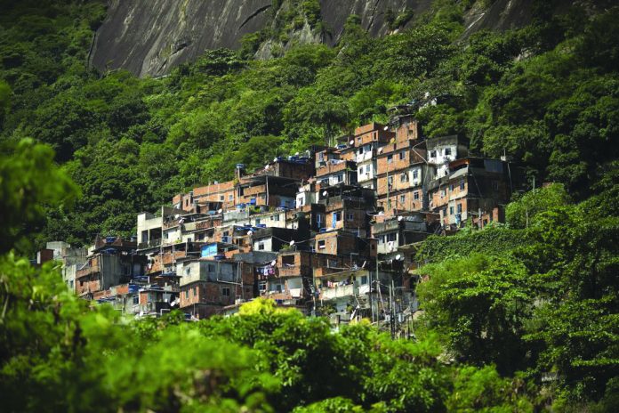 Rocinha favela The Rocinha favela stands out from a hillside in Rio de Janeiro, Brazil, Monday, March 16, 2020. Rocinha, Brazil's largest favela, is home to about 70,000 people as of the latest census. AP