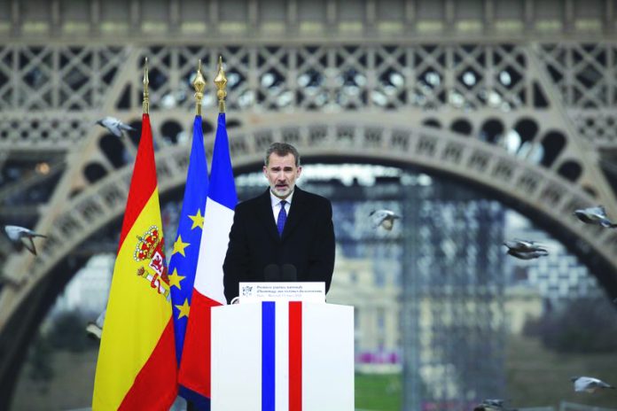 Spain's King Felipe VI Spain's King Felipe VI arrives to deliver his speech during a ceremony to honor victims of terror attacks in Europe, at the Trocadero in Paris, Wednesday March 11, 2020. AP