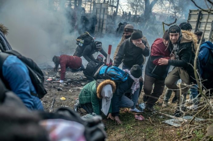 Turkey raises migrant pressure Migrants faced tear gas during clashes with Greek police on the Turkey-Greece border. AFP