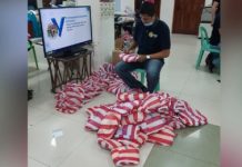 This man prepares personal protective equipment to be distributed to health practitioners in Antique on March 19. PNA