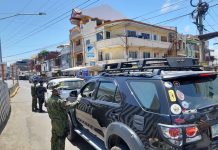 Aklan guv suspends public transport amid coronavirus Personnel of the Kalibo municipal police station strictly implement the enhanced community quarantine and check issued quarantine passes of motorists and passengers who enter the border control point in Barangay Poblacion, Kalibo, Aklan on March 28. PNP KALIBO