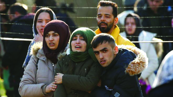 Syrian migrants Some migrants made their way to Greece’s Kastanies border crossing, but the Greeks already closed it. REUTERS