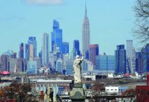 New York City closes all public schools for rest of academic year A view of the Manhattan skyline as seen from the Linden Hill Cemetery during the outbreak of the coronavirus disease in the Brooklyn borough of New York City, New York, United States on April 6, 2020. REUTERS