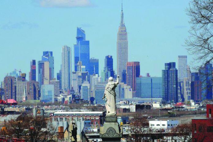A view of the Manhattan skyline as seen from the Linden Hill Cemetery A view of the Manhattan skyline as seen from the Linden Hill Cemetery during the outbreak of the coronavirus disease in the Brooklyn borough of New York City, New York, United States on April 6, 2020. REUTERS