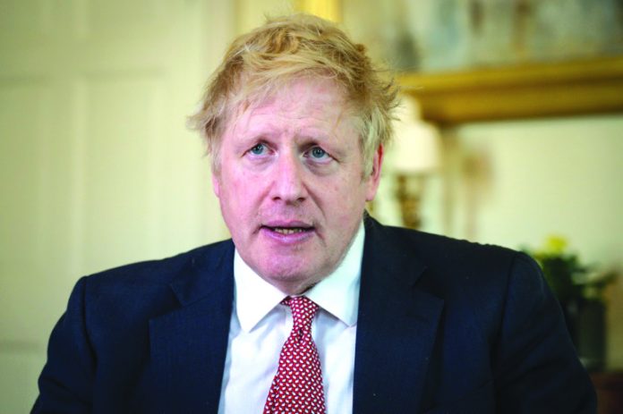 “We will defeat this coronavirus and defeat it together," Boris Johnson vowed, thanking medics he said saved his life “no question.”
