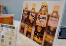 Corona beer producer halts brewing over coronavirus A sign advertising discounted Corona beers is displayed at the front desk of the Osaka Corona Hotel in Osaka, Japan March 19, 2020. Picture taken March 19, 2020. REUTERS
