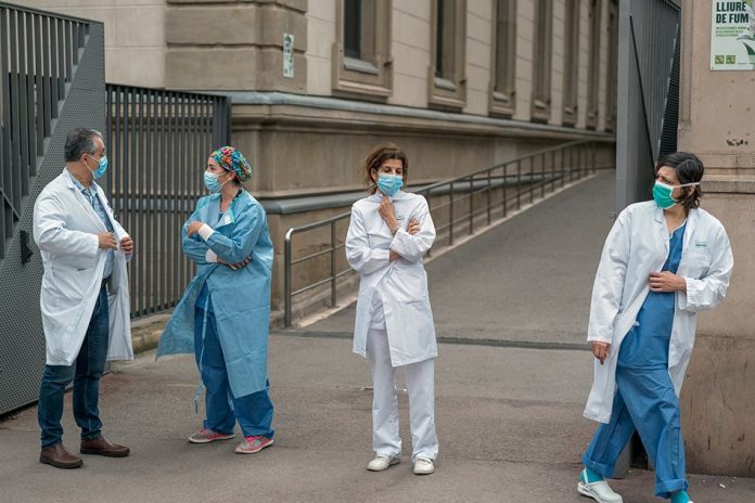 Health care workers Health care workers take a break from work at a hospital in Barcelona on Mar. 24, 2020. Chinese customs officials, facing accusations from Europe that some medical supplies have been defective, have begun inspecting every shipment of medical supplies for quality issues before export. THE NEW YORK TIMES