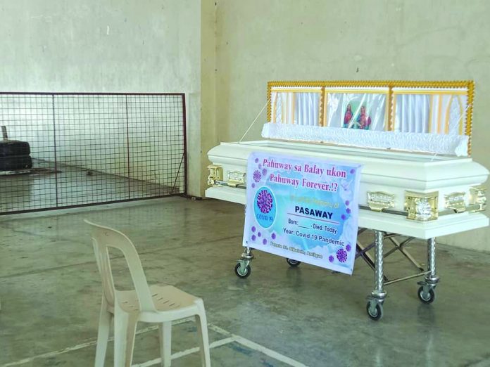 Covid casket Local authorities in Sibalom, Antique will require curfew violators to do vigil in front a casket. Police in this province have been ordered to apprehend without warning people disobeying curfew hours since April 23. DAVID VAGILIDAD