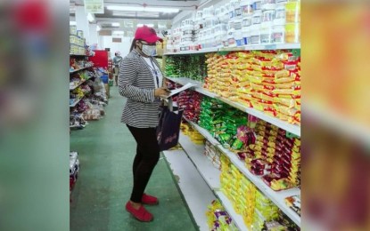 DTI Negosyo Center business counselor in Pandan town Gemma Montoya monitors supply of basic necessities in a store in Antique. The Department of Trade and Industry Antique Provincial Office on Thursday assured there is still enough supply of necessities in the province. DTI ANTIQUE