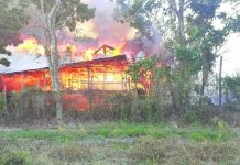 Smoke and flames are seen billowing from poultry farm houses in Barangay Binangkilan, Sta. Barbara, Iloilo around 2 p.m. on April 23. BARANGAY BINANGKILAN VIA FACEBOOK