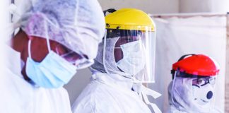 Hospital frontliners wear protective gears as they man the entrance of the emergency room in the Gat Andres Bonifacio Memorial Medical Center in Tondo, Manila. Over 1,000 healthcare workers in the country were positive for coronavirus disease 2019, according to the Department of Health. ABS-CBN NEWS