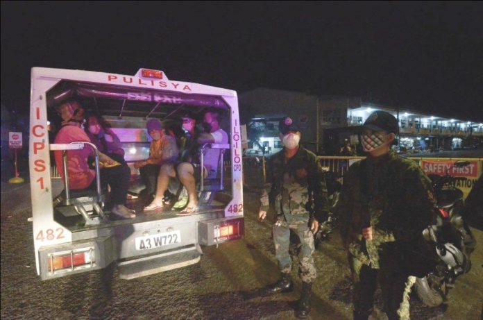 Iloilo City Police officers during ECQ curfew